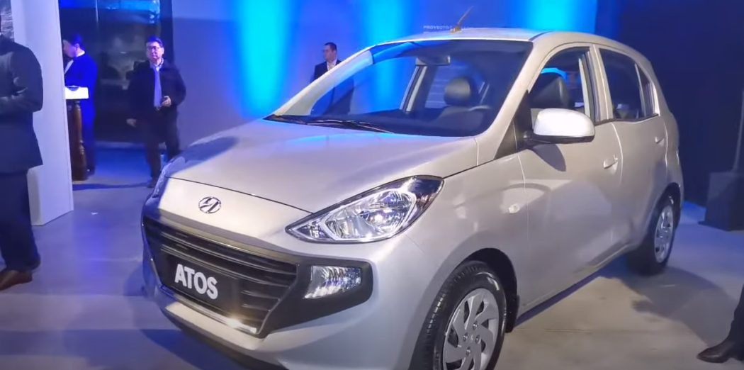 Side view of silver Hyundai Atos at a car show