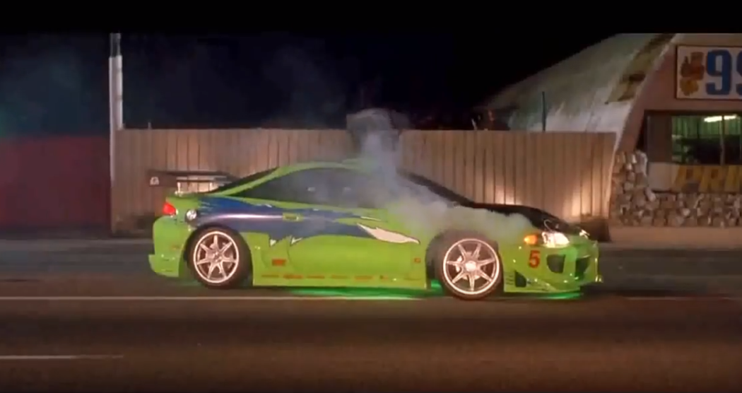 An image of a green ricer car from the "Fast and the Furious" movie